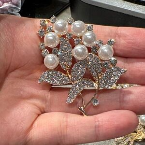 Elegant Gold and Silver Floral Brooch